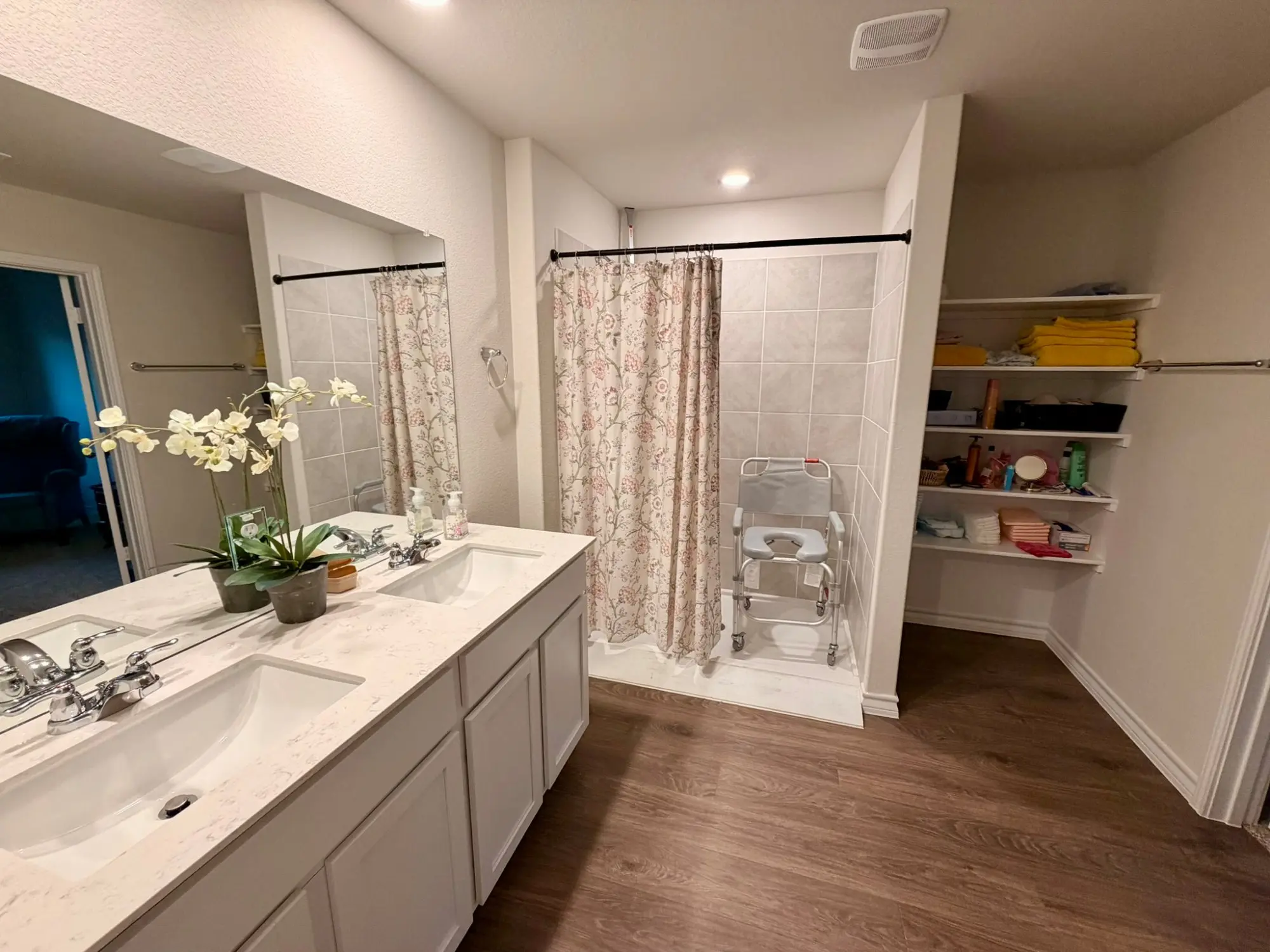 Accessible bathroom with walk-in shower at Comfort Care Home